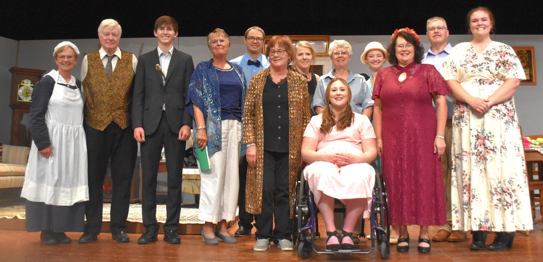 Above: The Osceola Community Players put on their third annual play. Pictured are (left to right) Roxanne Page, Dave Rinehart, Hayden Lavaley, Suzanne Peterson, Clyde Ericson, Gail Channer, Kendra Gustafson, Wanda Doerr, Erika Burritt, Neve Pavlik, Debbie Girard, Kerry Voigt and Payton DeMers-Sahling. Below: This scene is acted several times as one by one someone is murdered. PCN photos by Beth Sparrow.