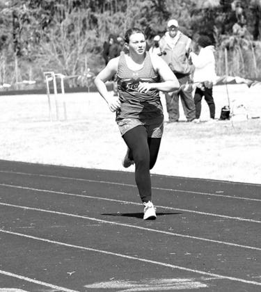 Allie Howells runs the 400 meter dash for High Plains at the Osceola Invite.