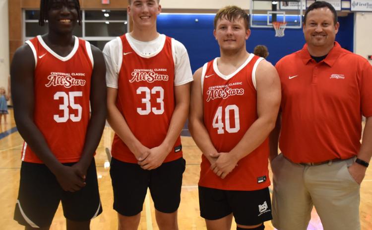 Cross County had three graduates and Coach Jimmy Blex at the Centennial All-Star Game. Pictured is James Elgin, Ashton Seim, Alex Noyd and Coach Blex. Blex was assistant coach for the red team. PCN photo by Beth Sparrow.